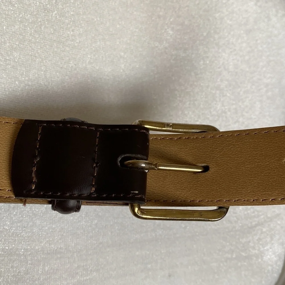 men’s brown leather belt size 40’. No brand listed.